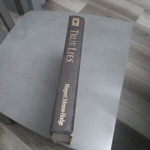 Source Unknown Black and Gold Book